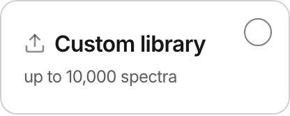 The custom-library chip, offering to search a reference library of your own alongside the deployed ones, with its spectrum cap stated on it.